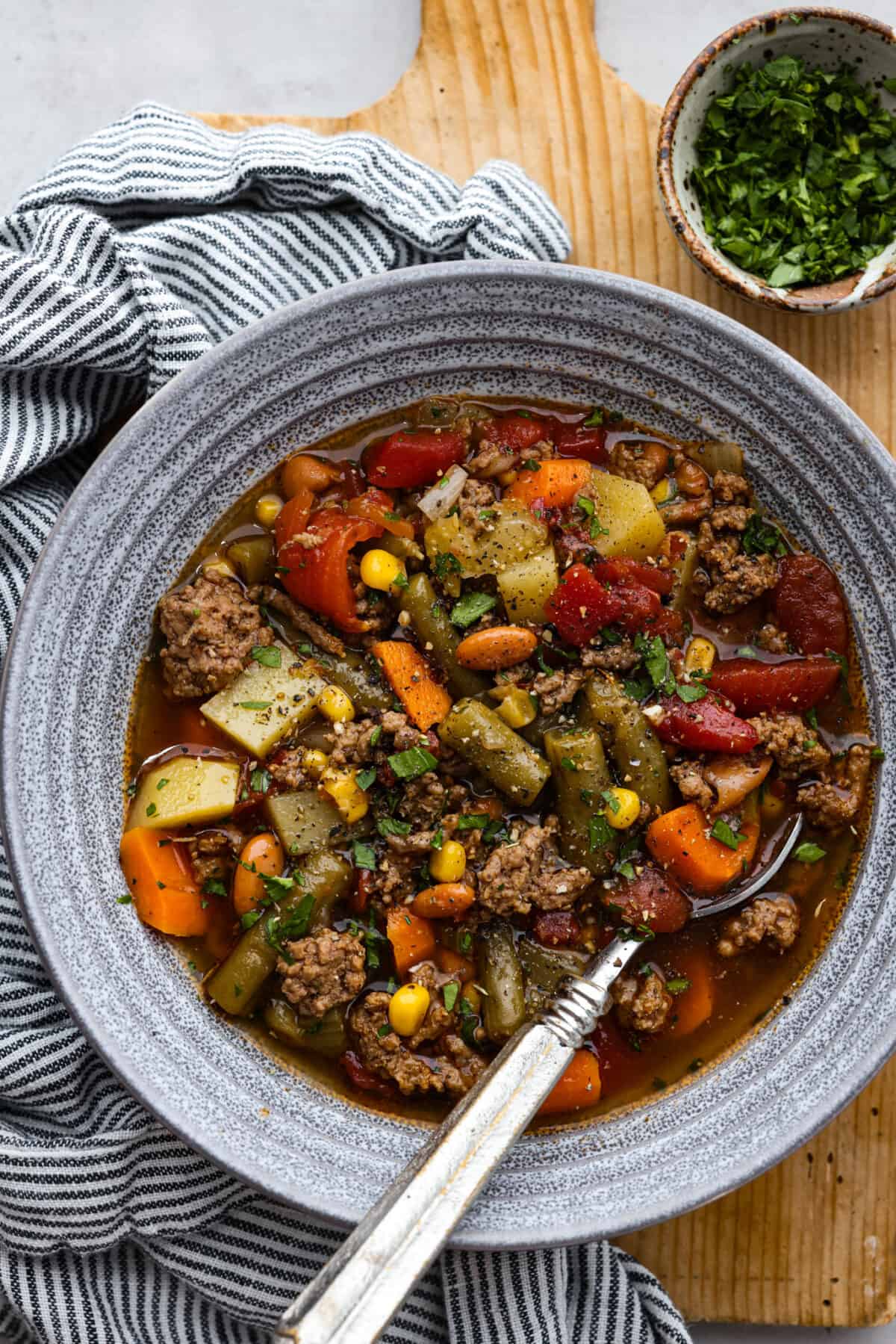 A bowl of cowboy hamburger soup. 