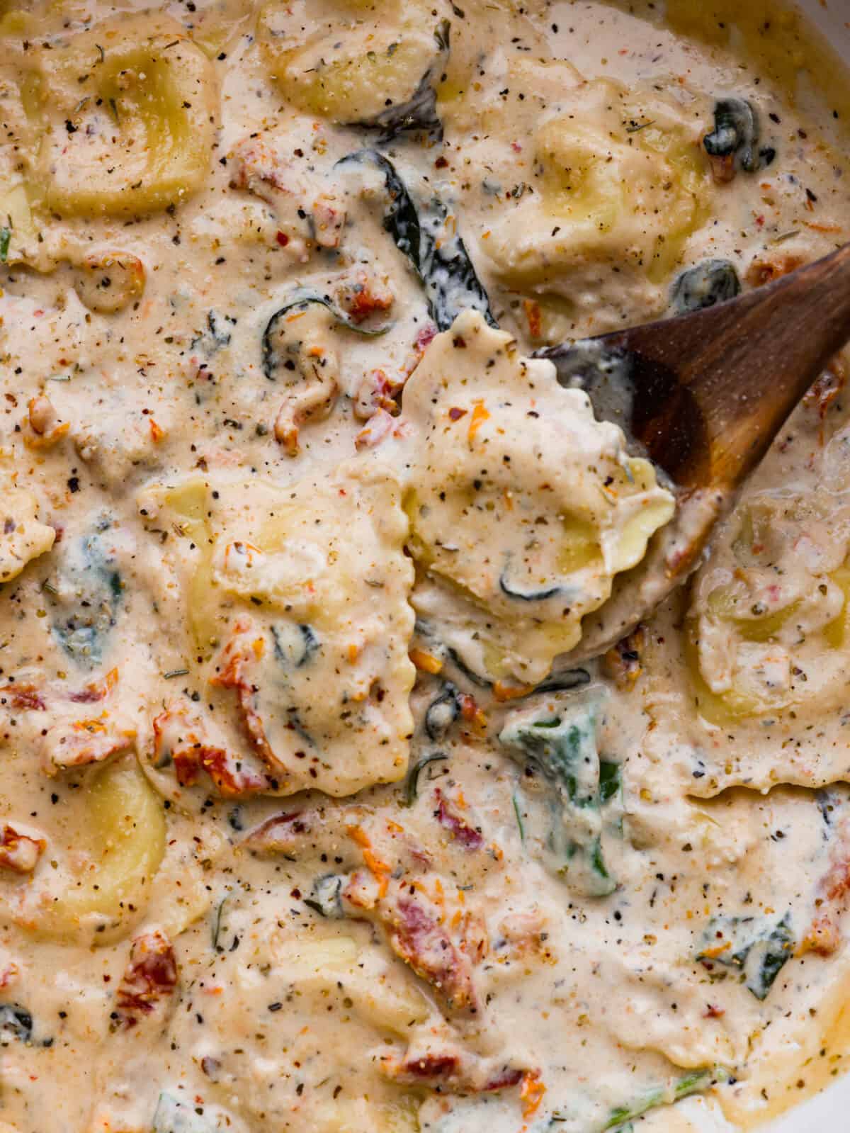 Closeup of creamy Tuscan ravioli.