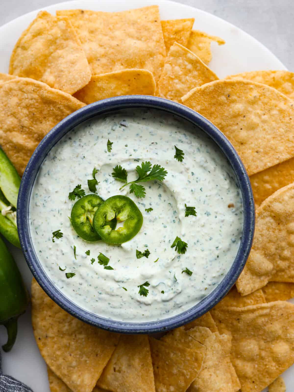 A close up top view of jalapeño dip. 