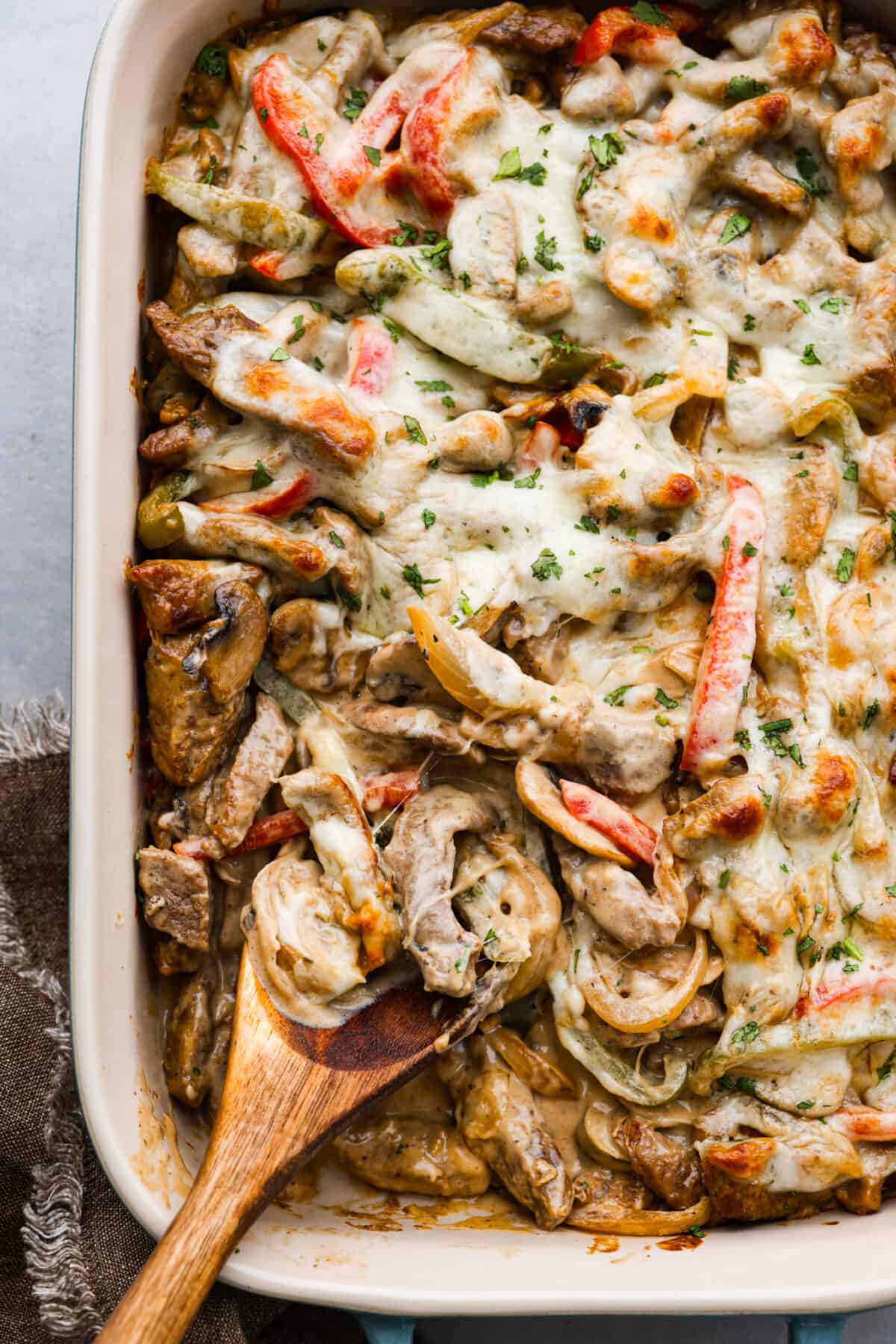 The top view of Philly Cheesesteak casserole in a 9x12 baking dish. 