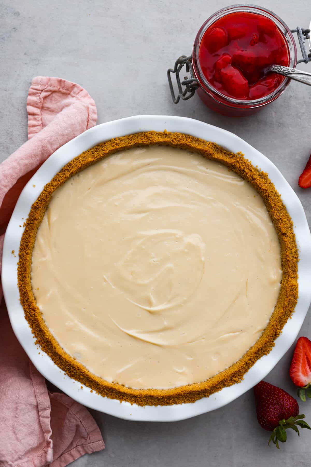 The top view of a cream cheese pie. 