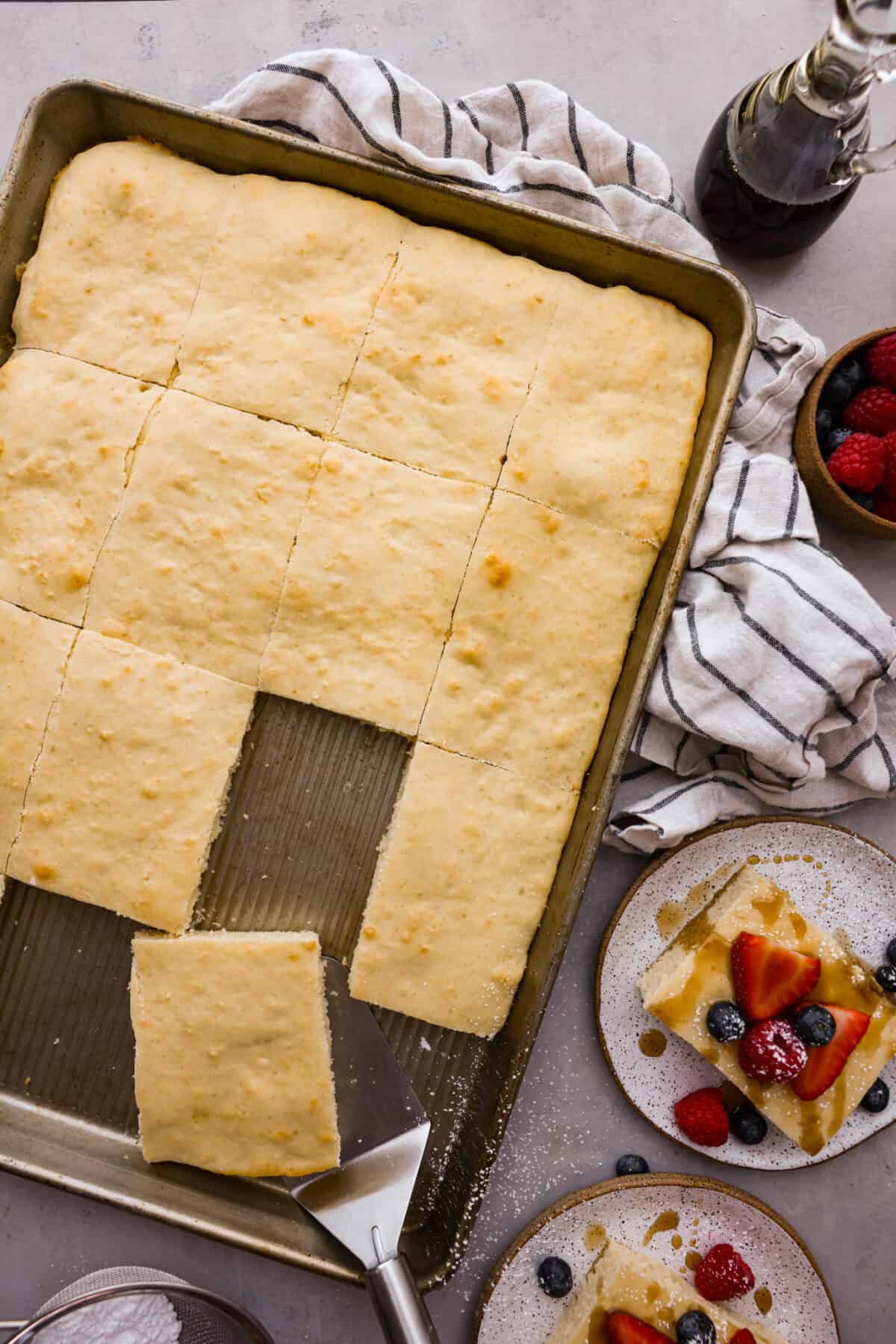 Sheet pan pancakes, cut into squares.