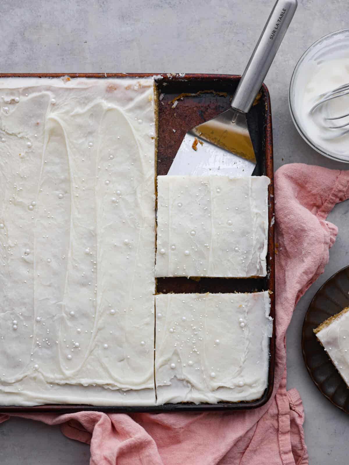 Top-down view of the Texas sheet cake, cut into squares.