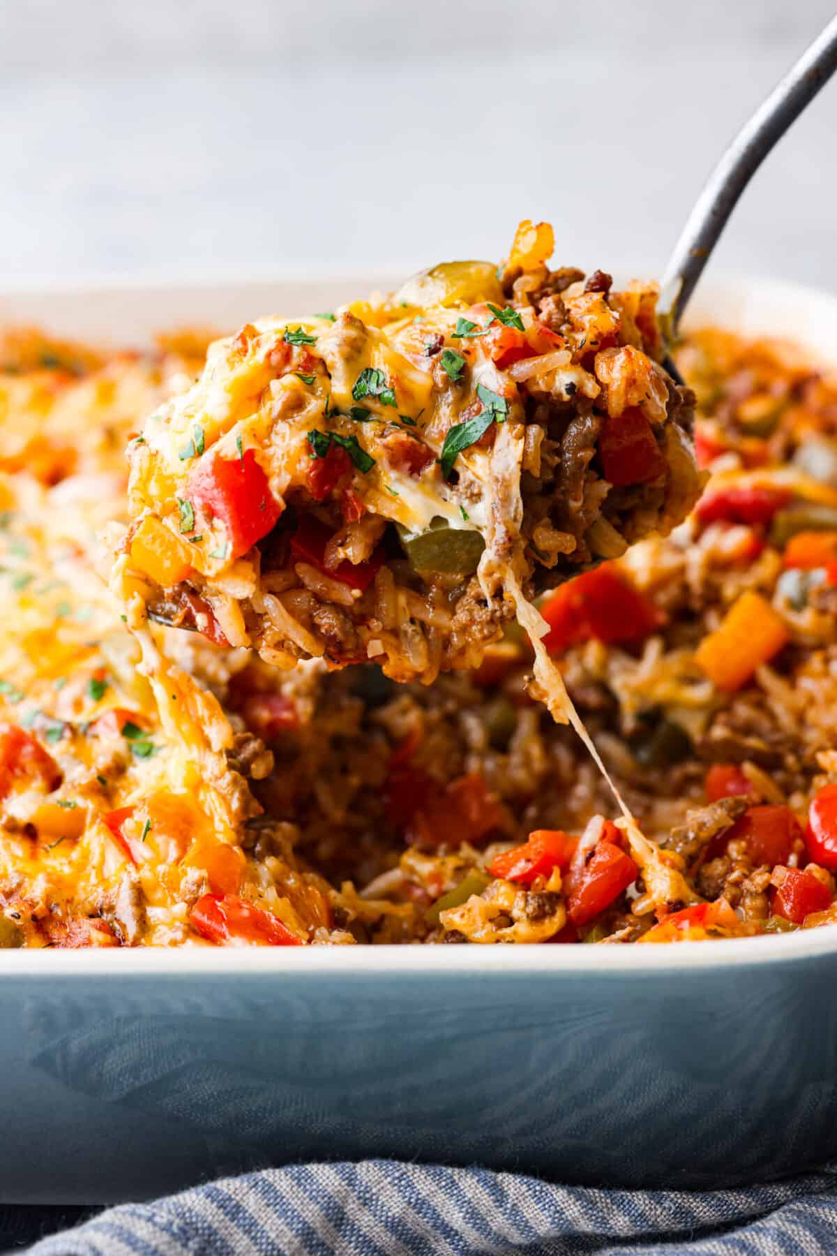 Closeup of a scoop of stuffed pepper casserole.