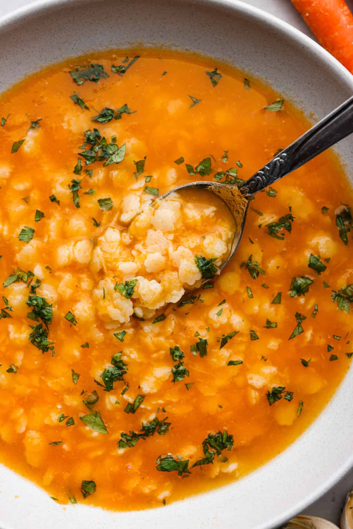 Closeup of pastina soup.