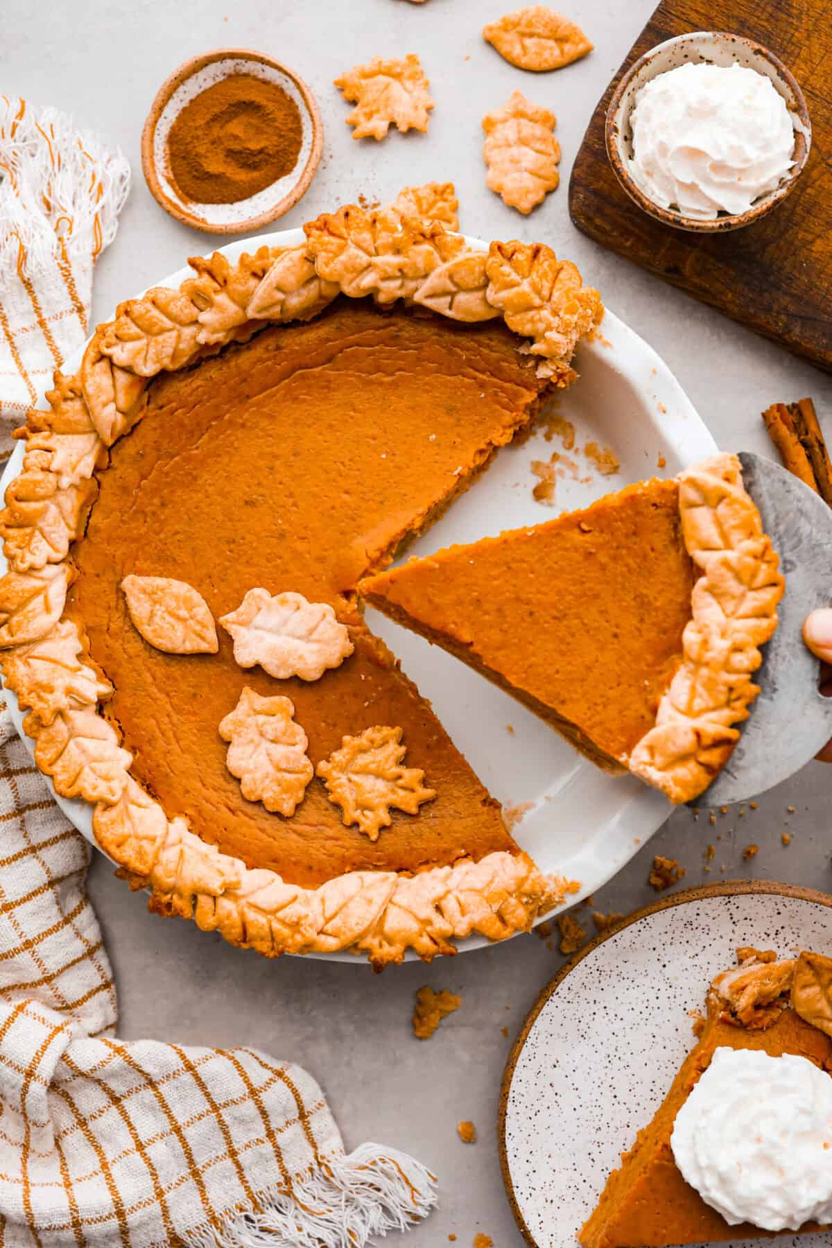 Top-down view of pie with slices cut out of it.