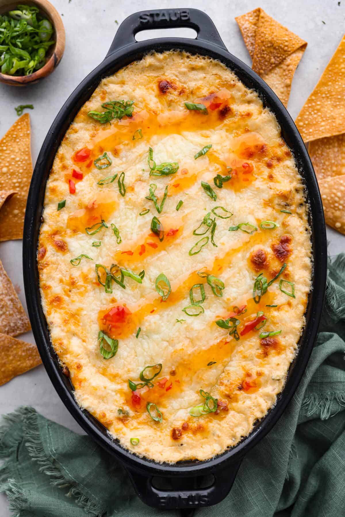 Top-down view of the baked dip in a casserole dish.