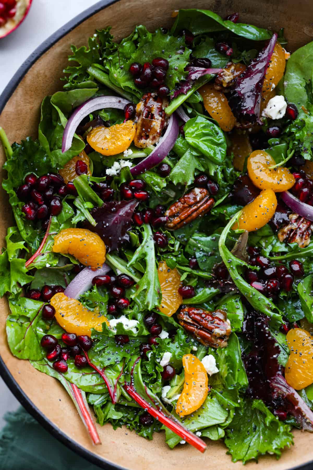 Top view of Christmas salad in a wood bowl.