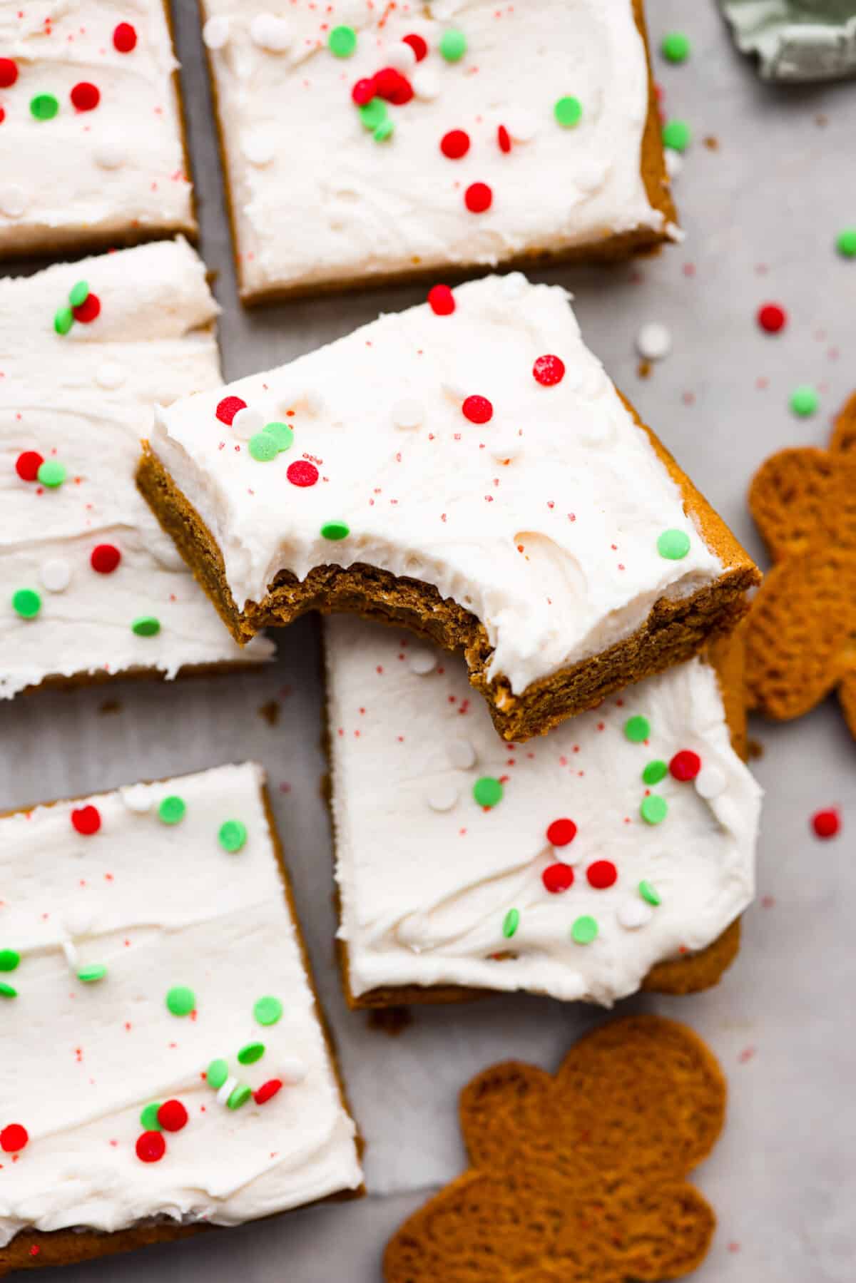 Close view of a bite out of a sugar cookie bar.