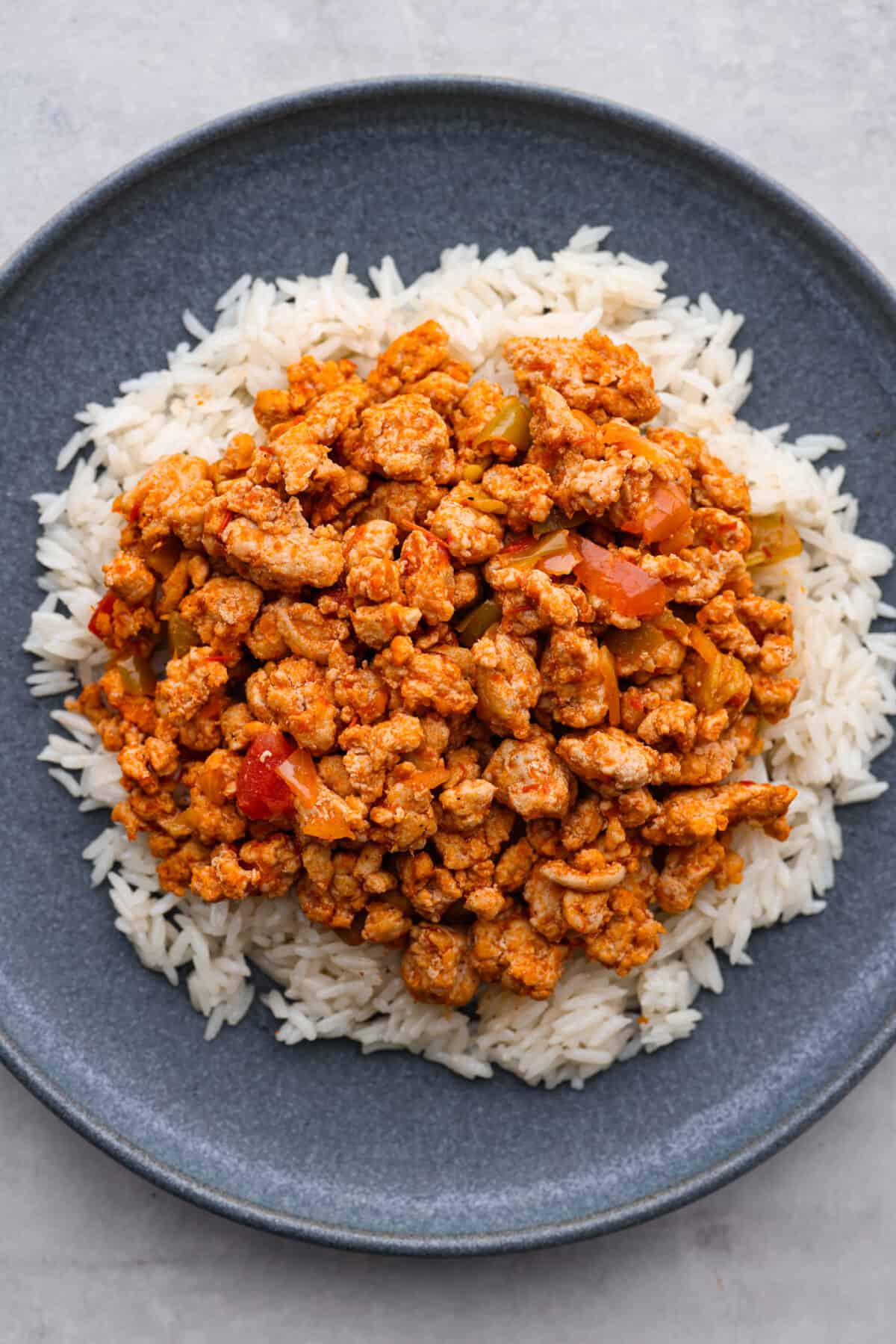 White rice topped with turkey taco meat.