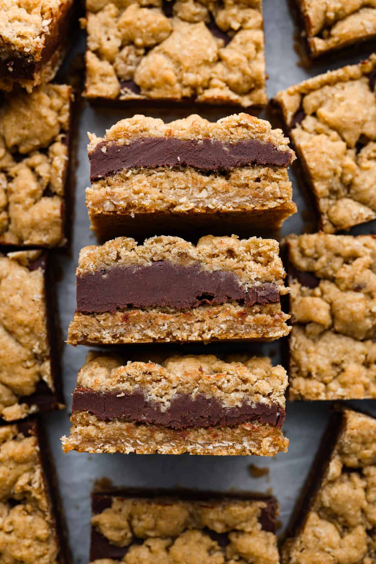 Close view of oatmeal fudge bars close together. 