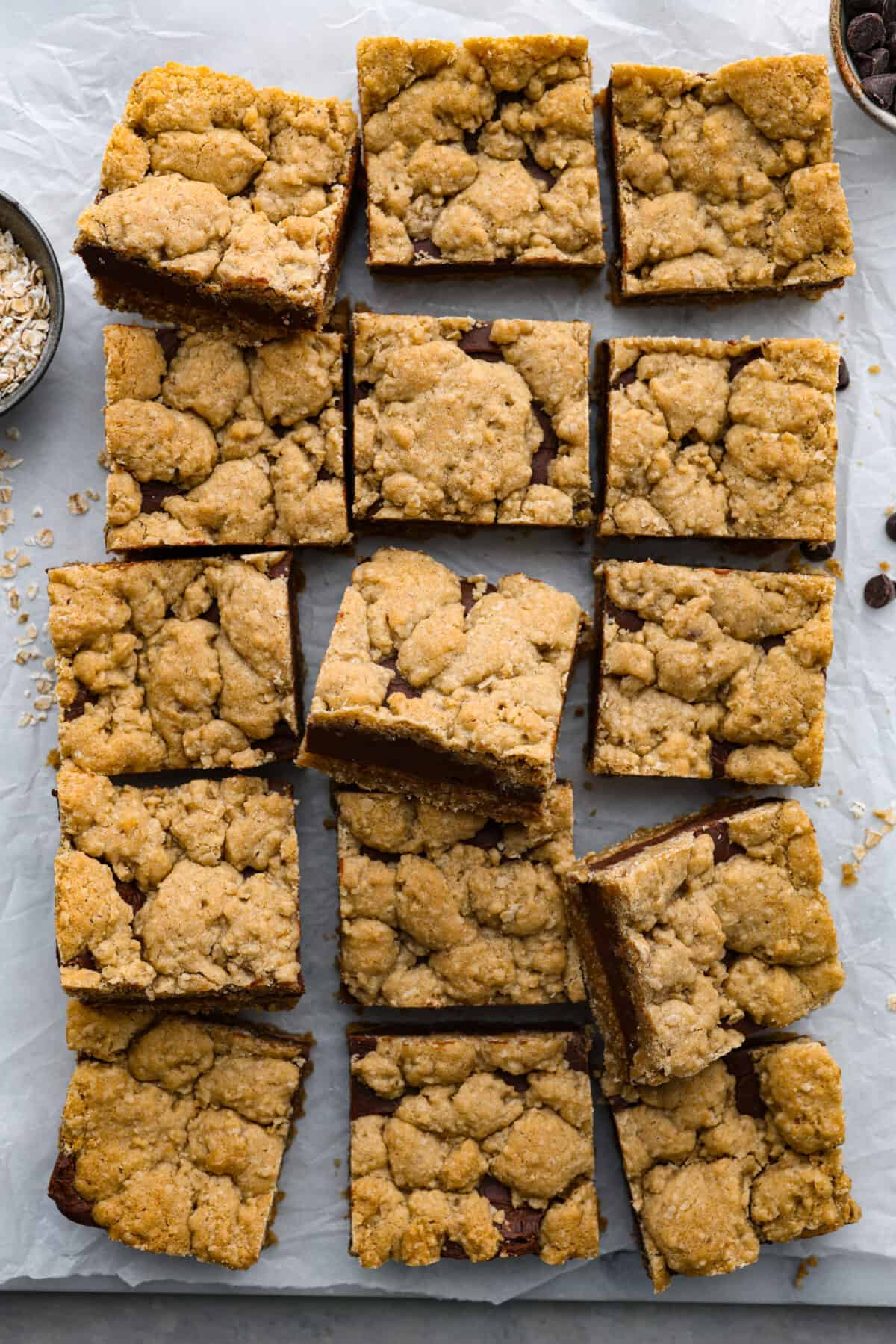 Overhead view of cut bars on parchment paper.