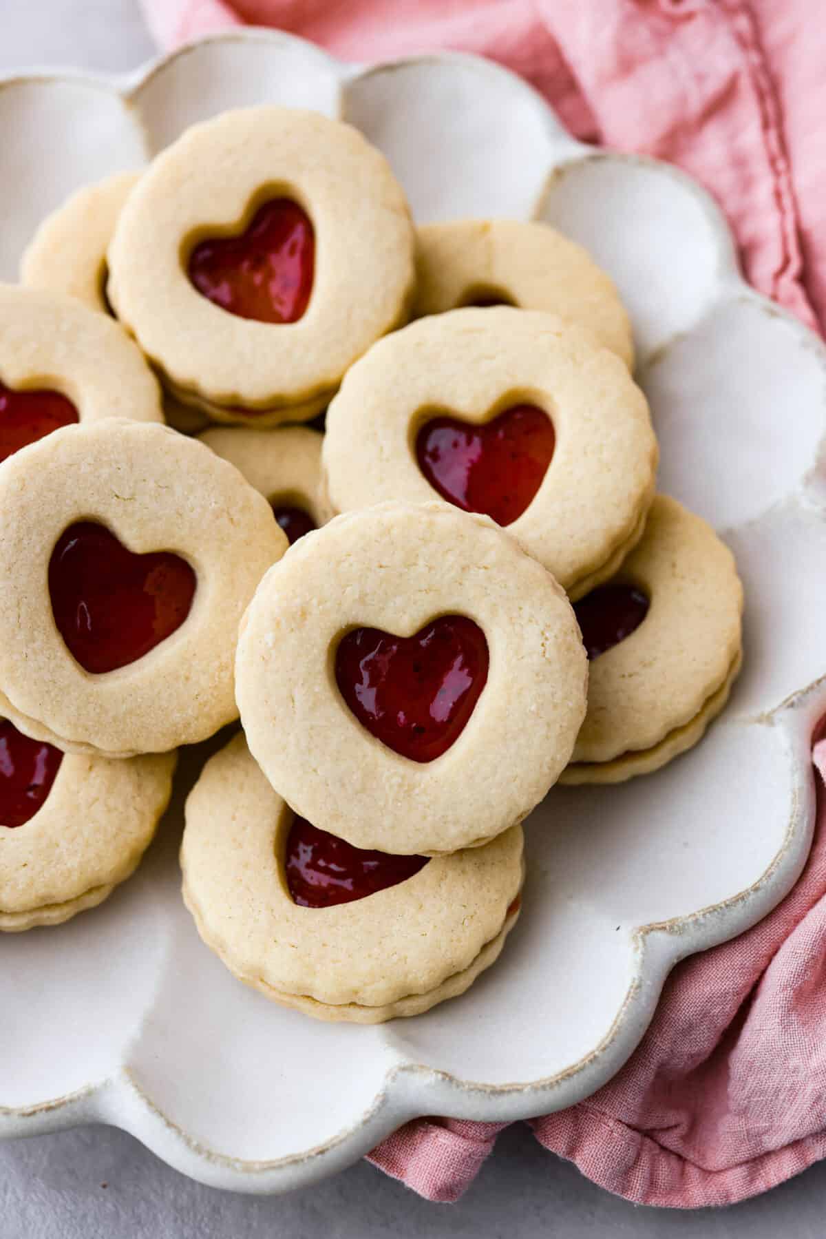 Cookies served in a white, scalloped dish.