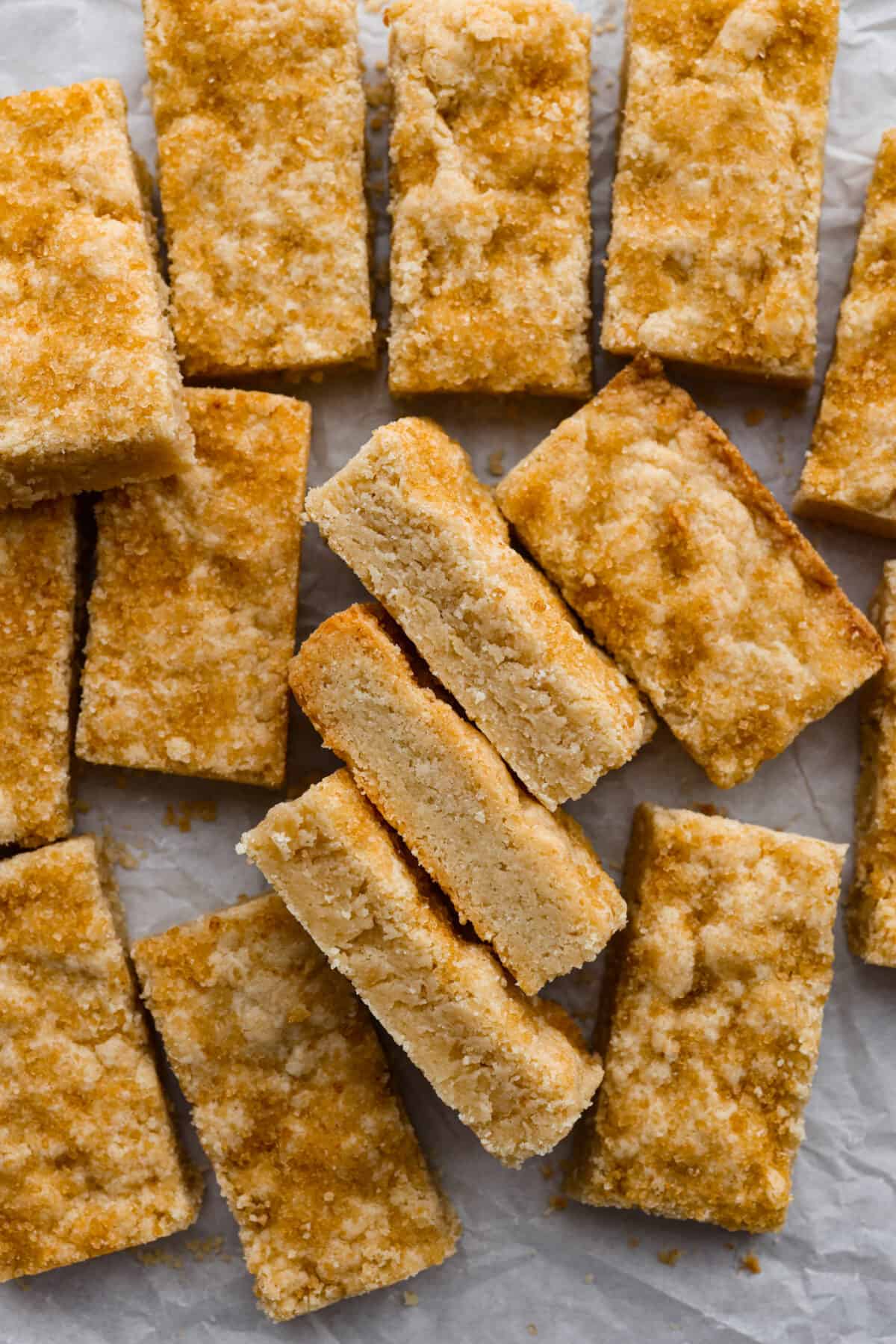 A close up of the shortbread Ted Lasso biscuits on parchment paper. 