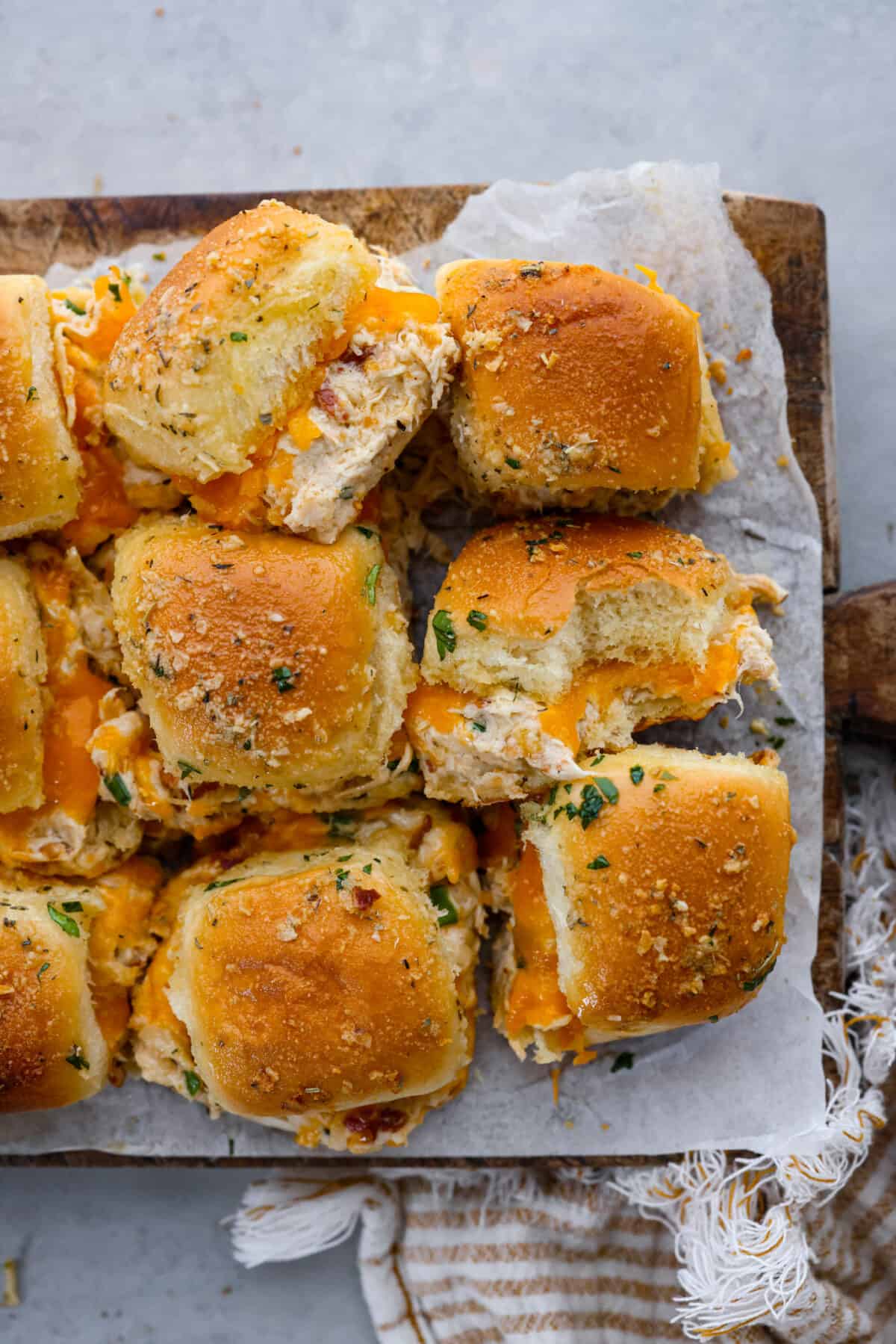 The top view of sliders on parchment paper. 