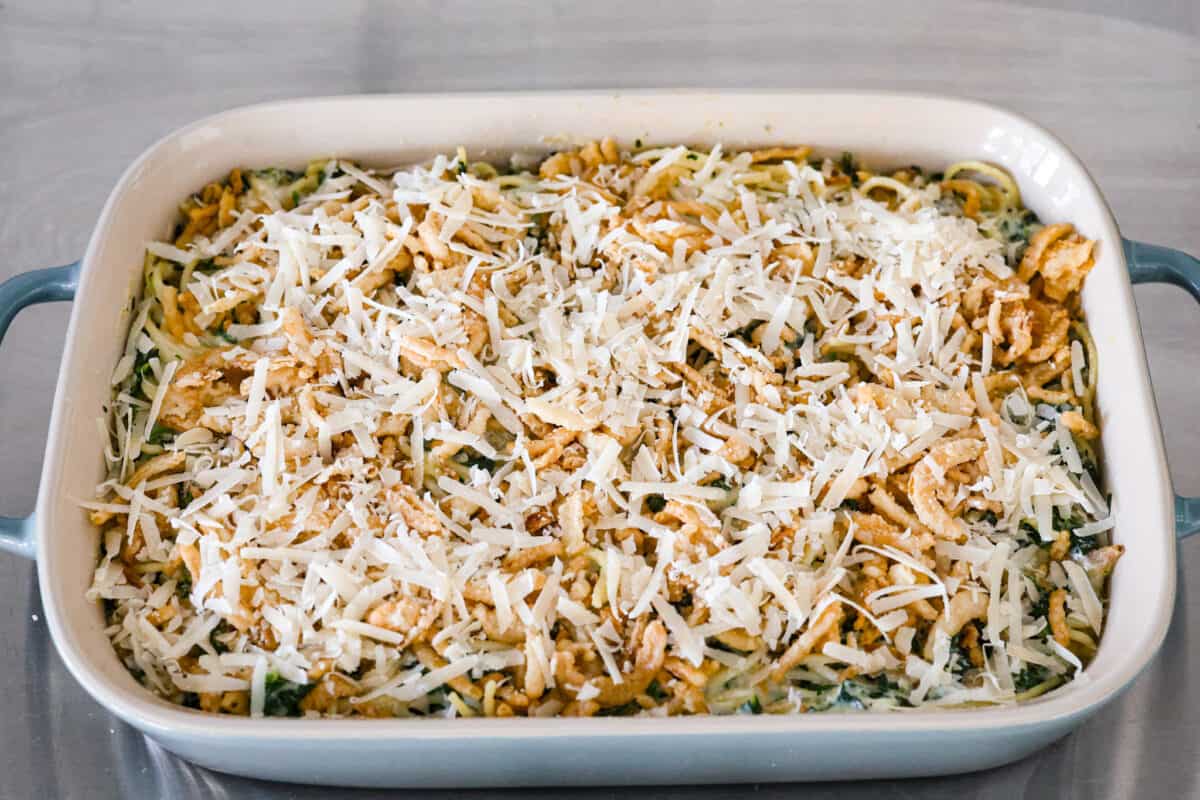 Fourth process photo of Monterey spaghetti added to a baking dish before baking.