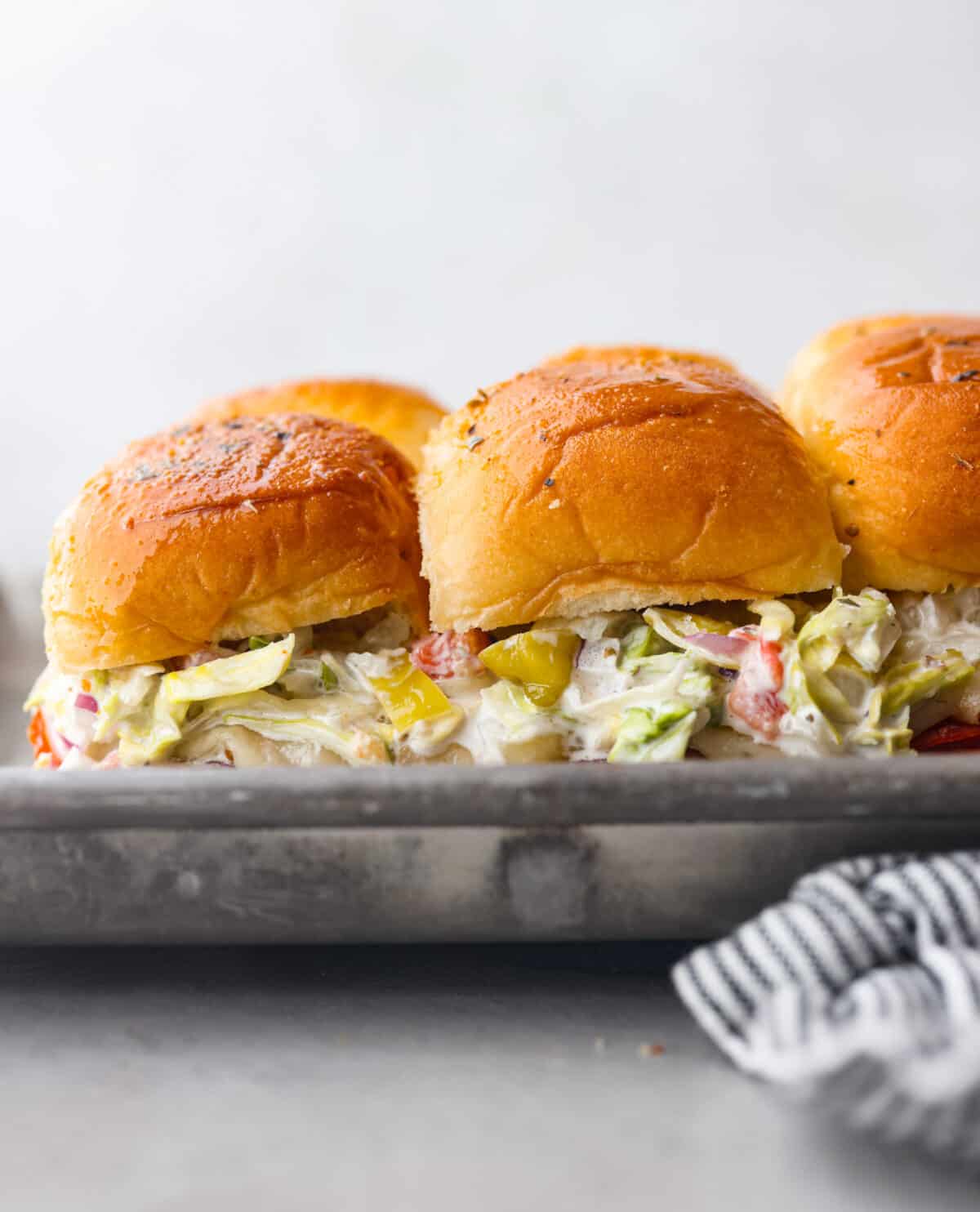 Grinder sliders in the pan.