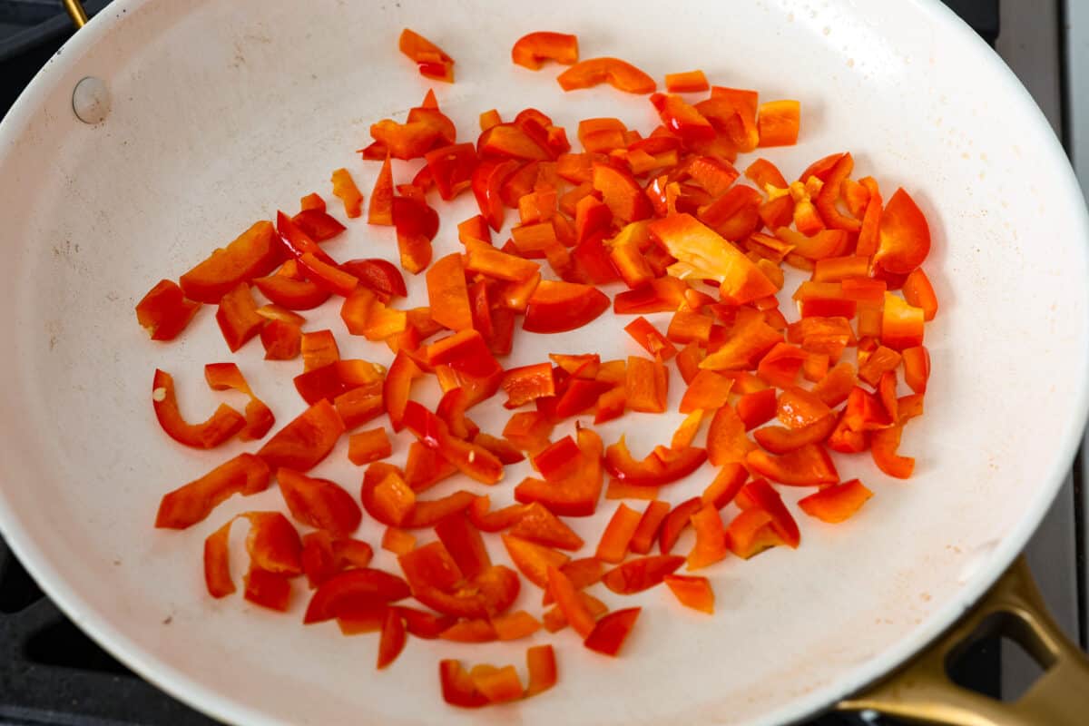 Sautéing the peppers 