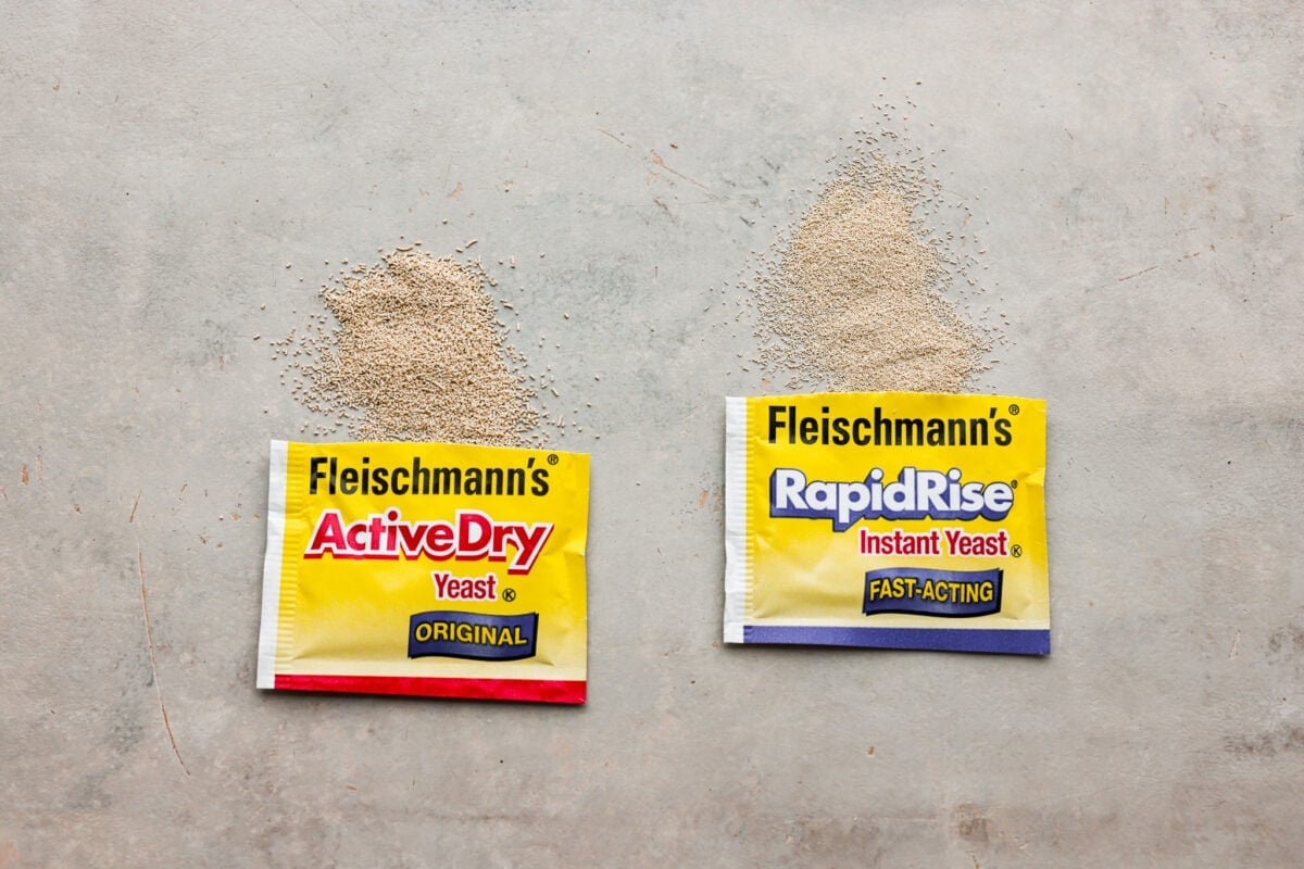 A picture of 2 yeast packets, one is active dry and one is instant yeast. 