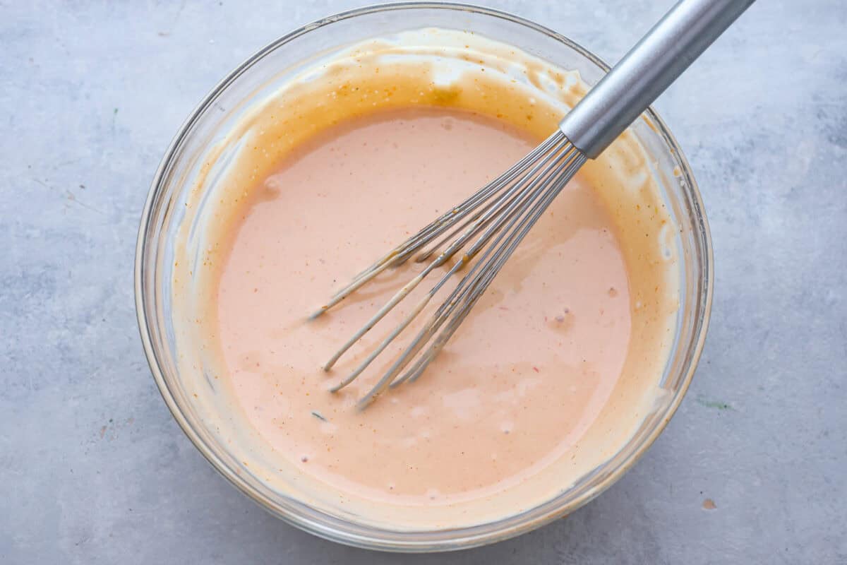 Top view of the ingredients all whisked together in a glass bowl. 