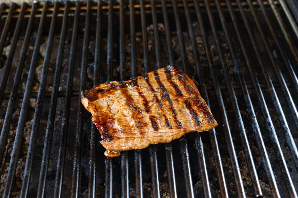 Skirt steak being grilled. 