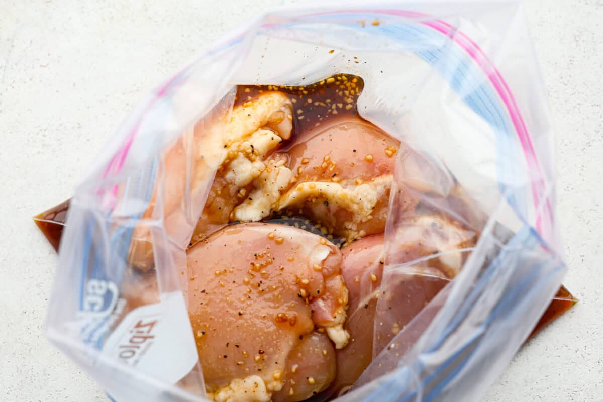 Chicken thighs in a plastic ziplock bag. 