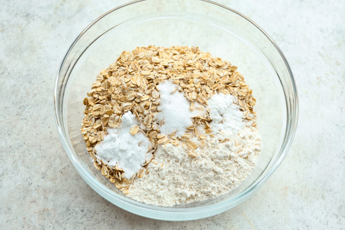 Process photo of dry ingredients added to a bowl.