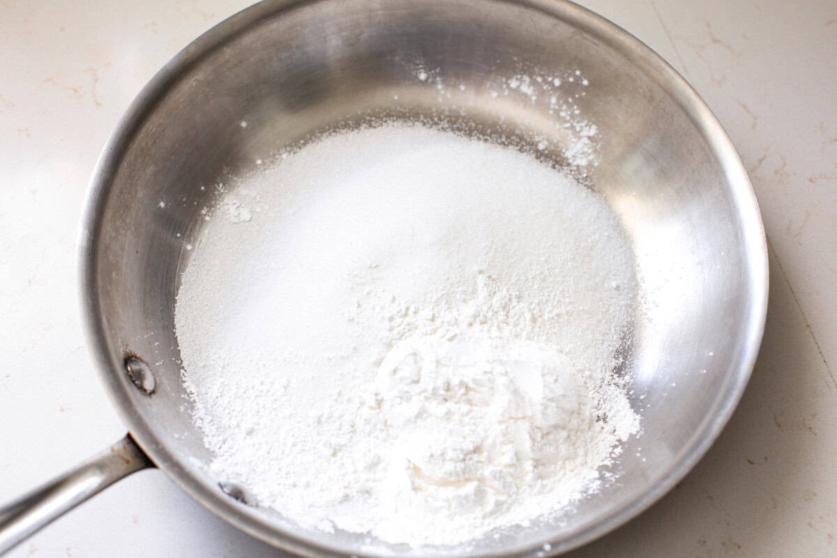 clear gel and sugar mixed together in a pan. 