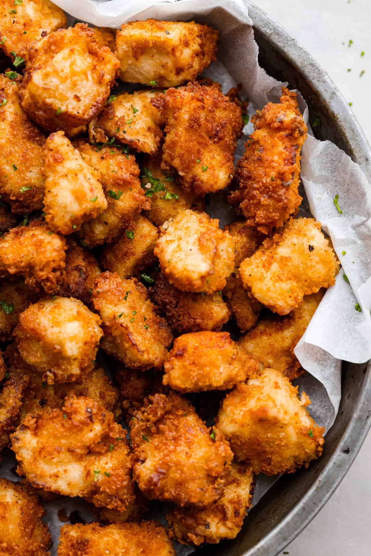 A close up of chick-fil-a nuggets on a platter. 