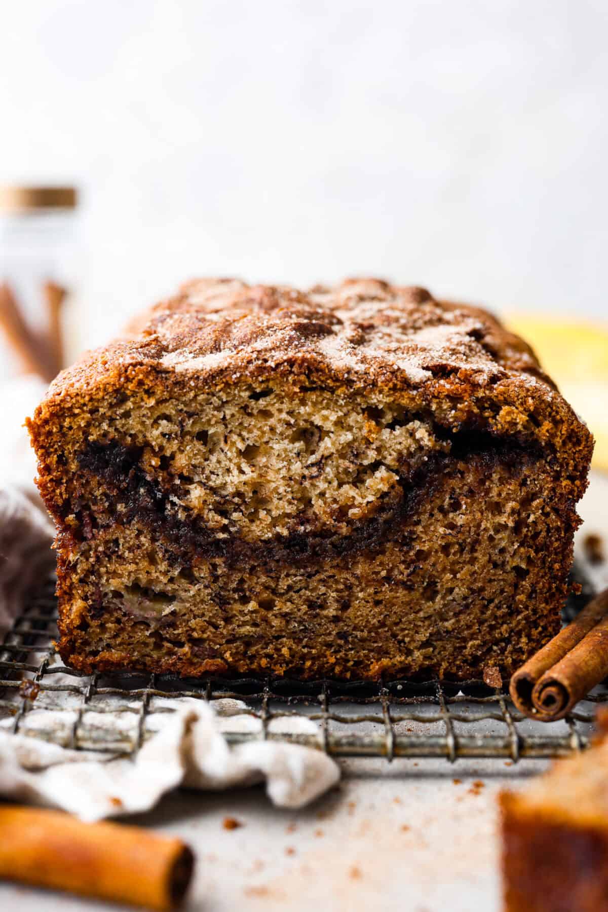 Side shot of the cut through the middle of the banana cinnamon swirl loaf. 