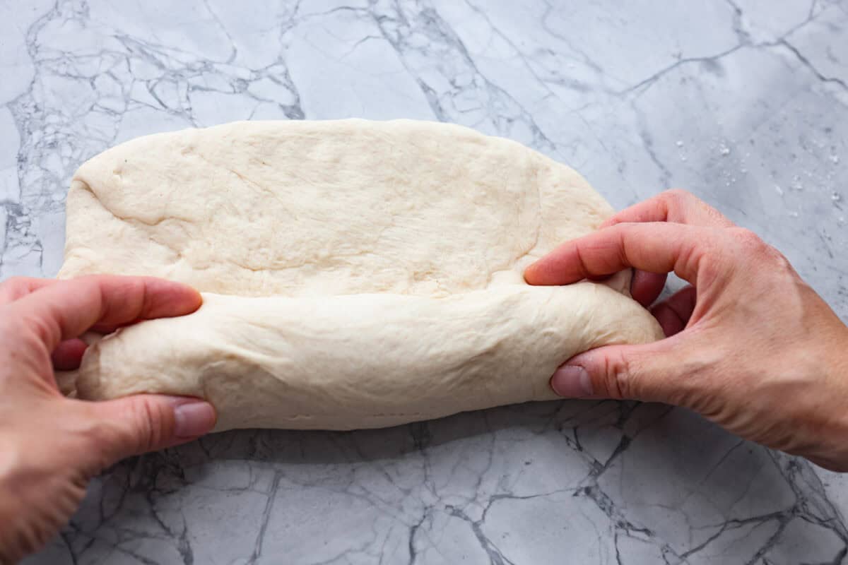 Fifth photo of shaping the dough.