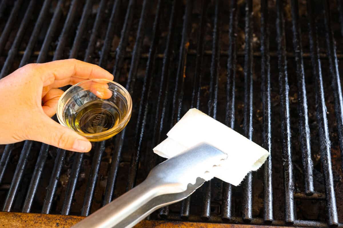 Second photo of oiling the grill.