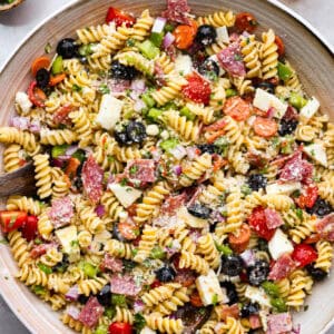 Overhead image of a large bowl with Italian pasta salad