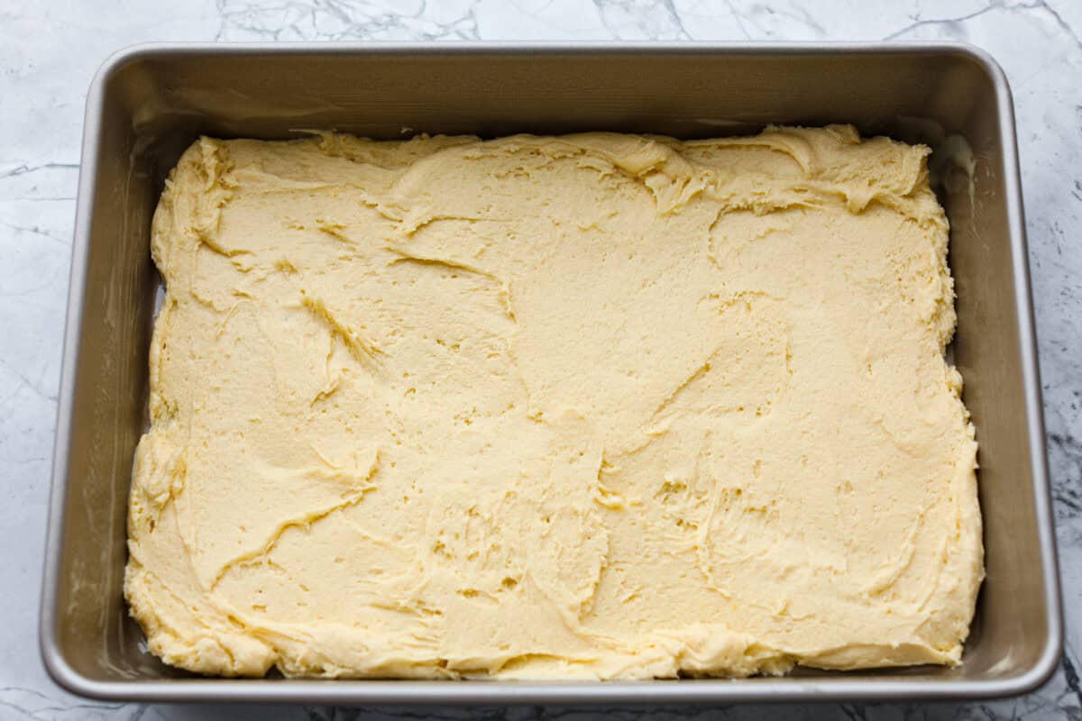 Batter spread in the bottom of the pan. 