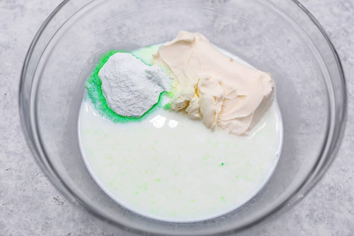 First photo of the milk, cream cheese, and pudding powder in a bowl.