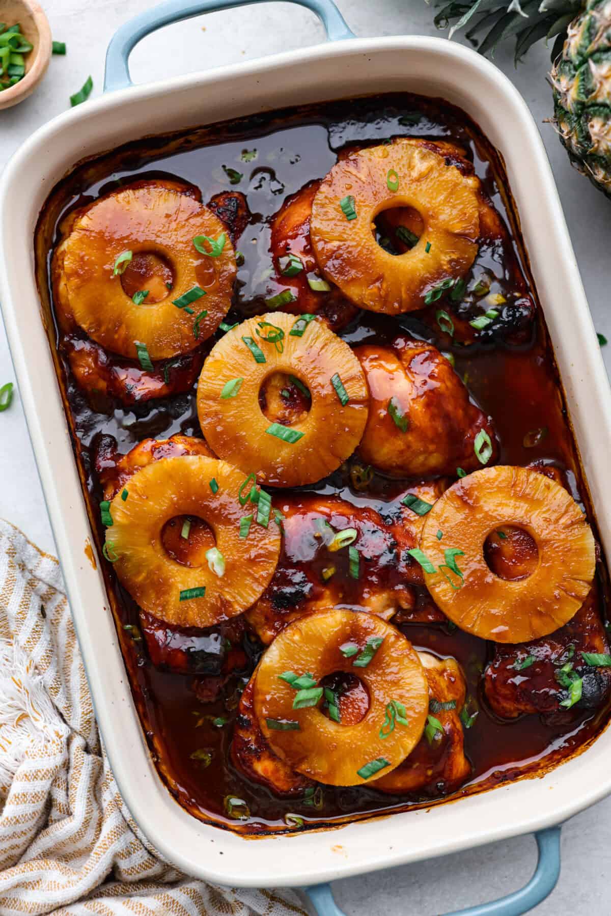 Top view of baked Huli Huli chicken in a baking dish.