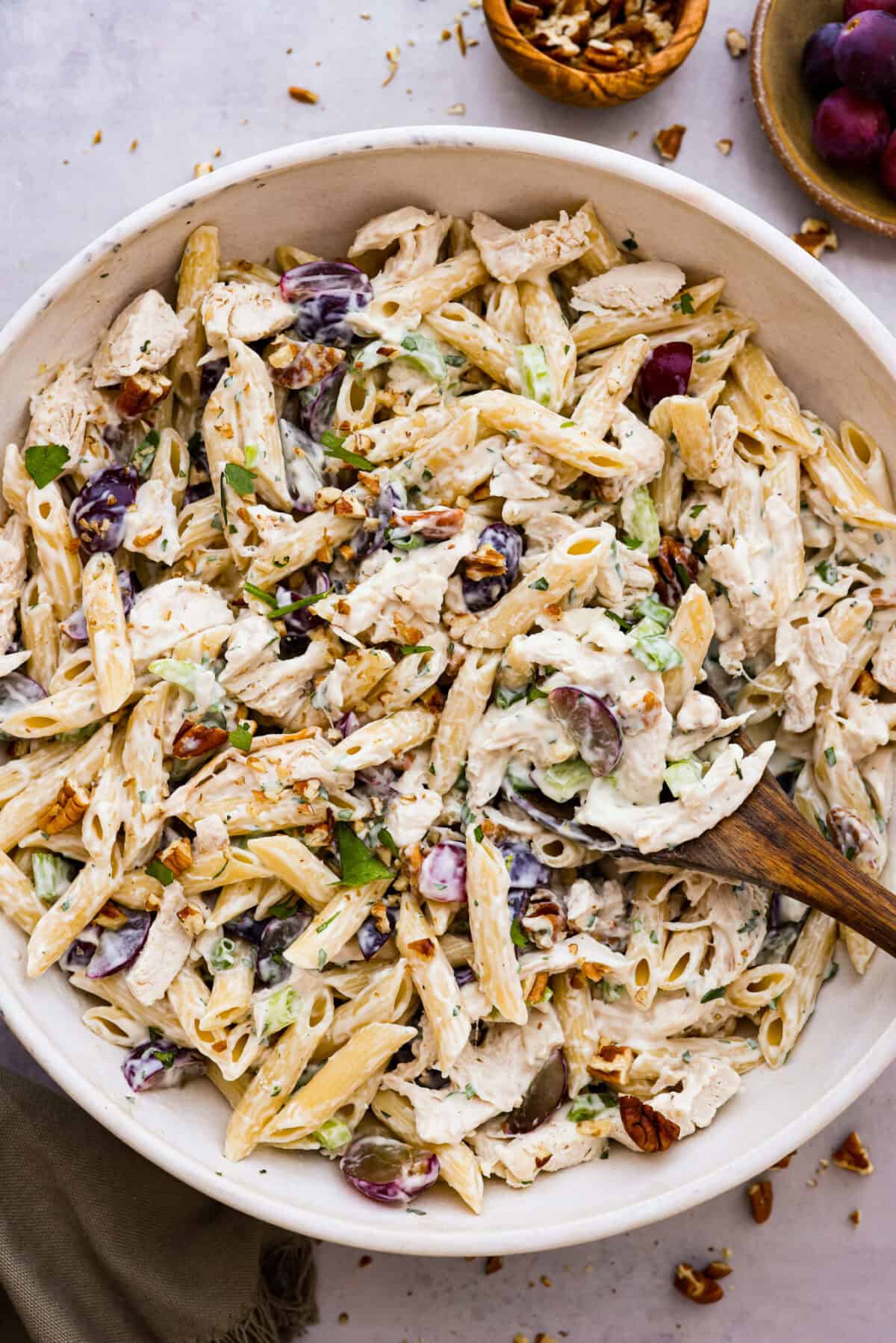 Overhead shot of a large bowl of healthy chicken pasta salad. 