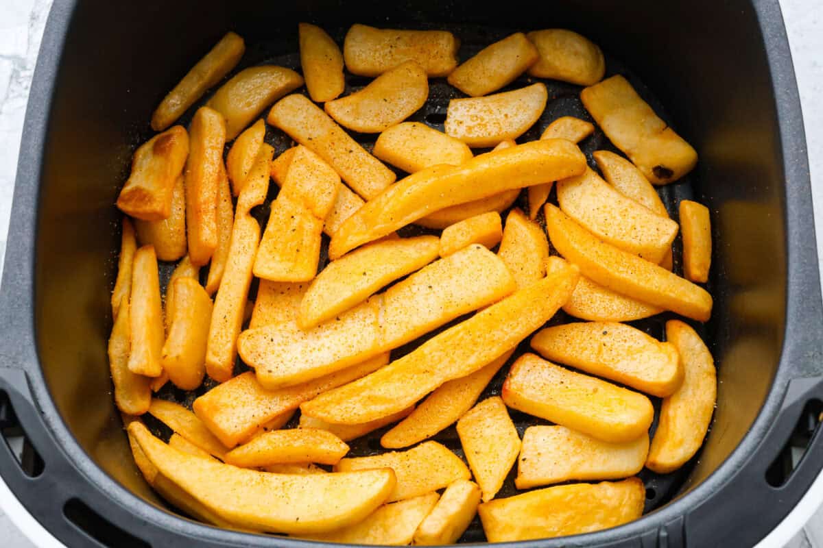 Second photo of cooked French fries in the air fryer.