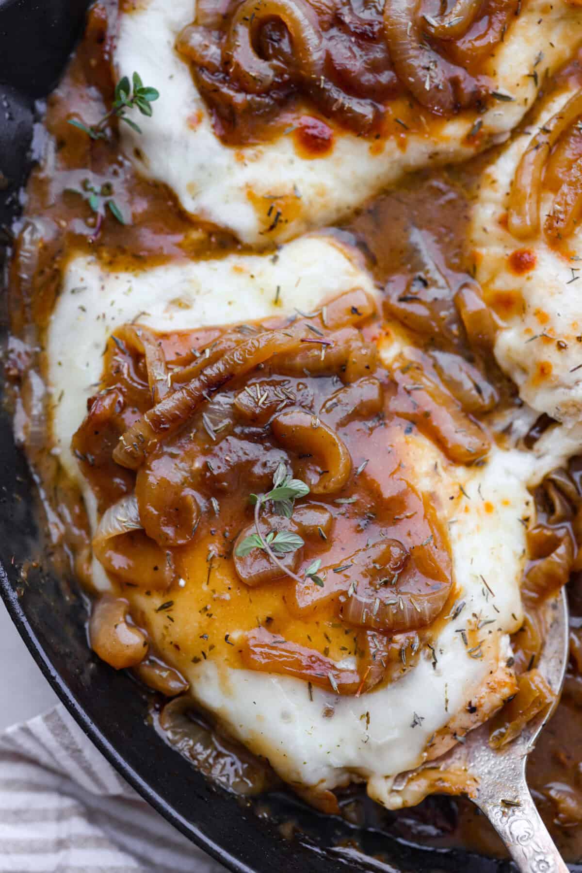 Close up shot of finished skillet french onion chicken. 