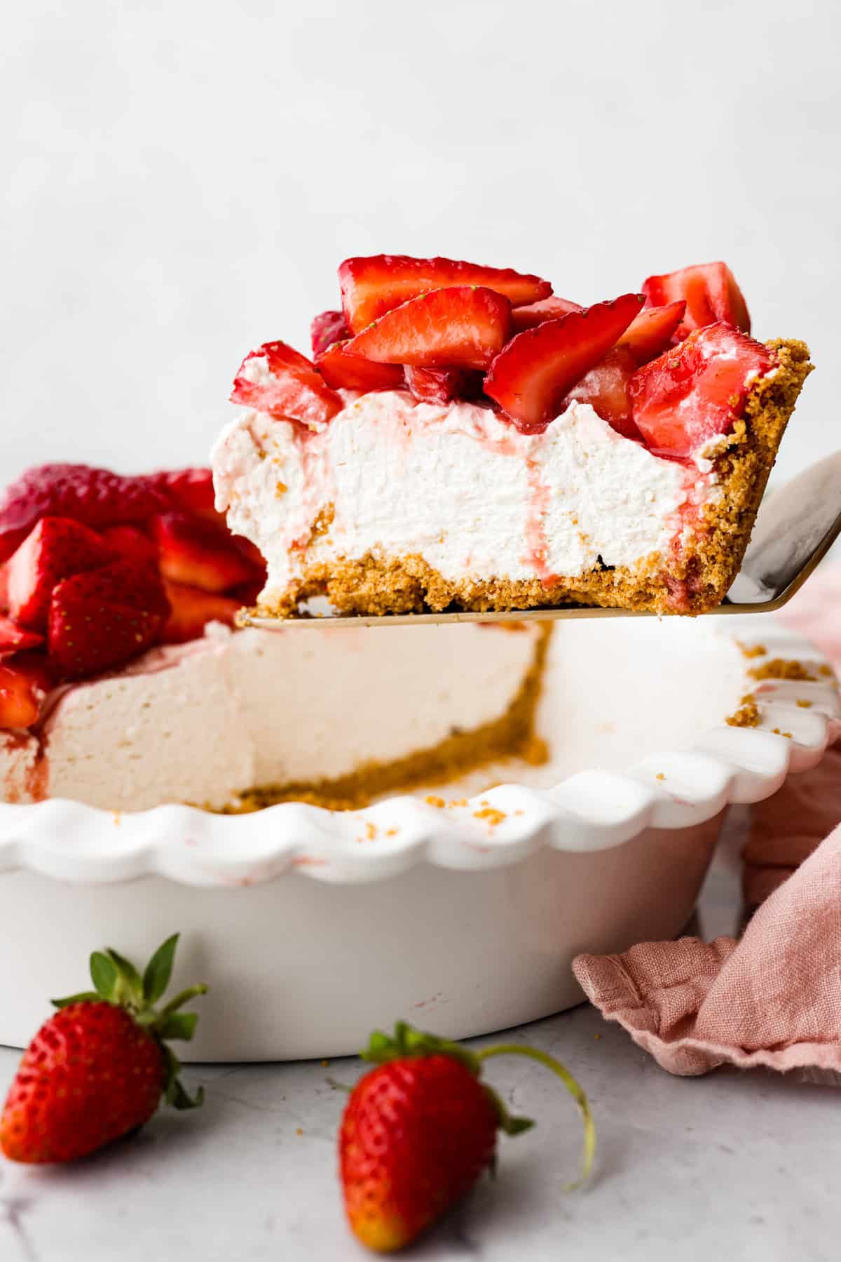 Side view of slice of pie being lifted from pie dish