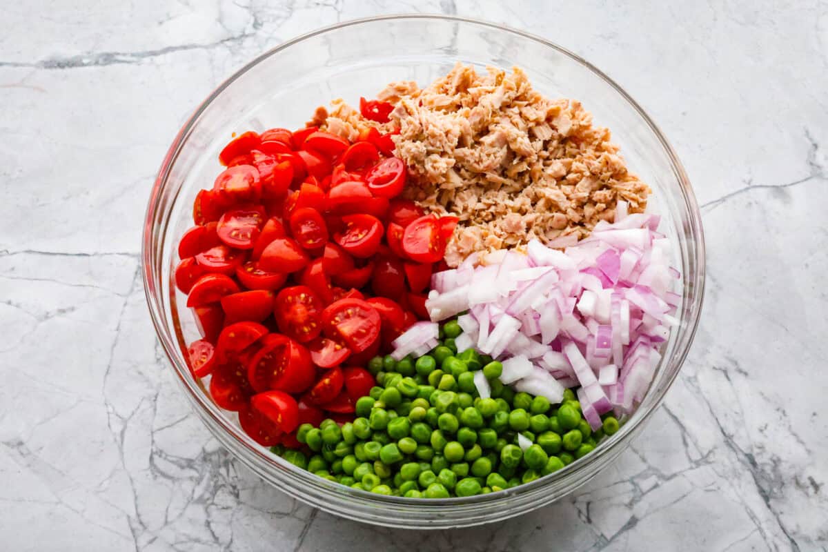 First photo of the salad ingredients in a bowl.