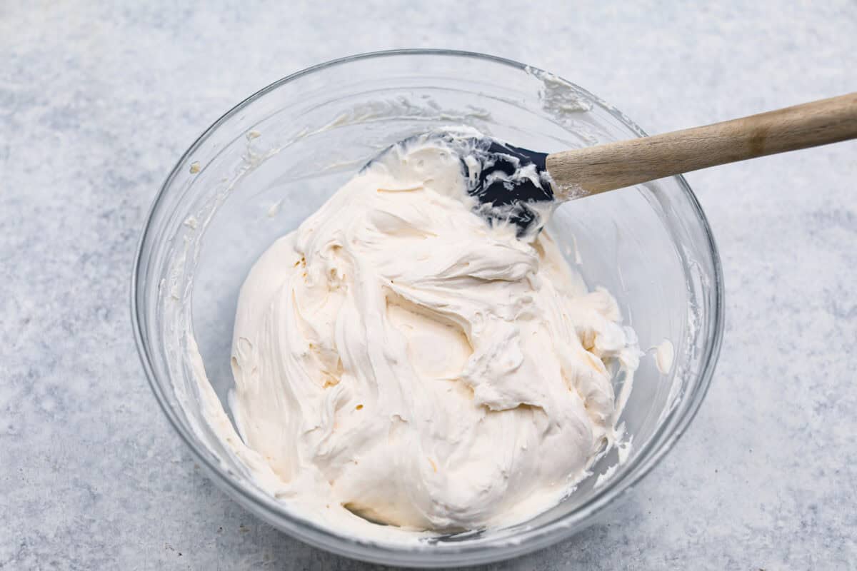 Overhead shot of the cream cheese filling mixed with all of the whipped topping. 