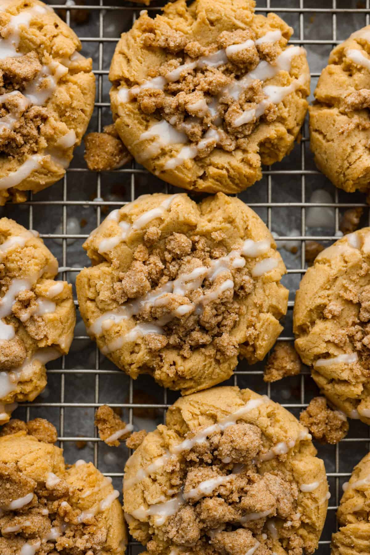 Close up shot of coffee cake cookies on a cooling rack.