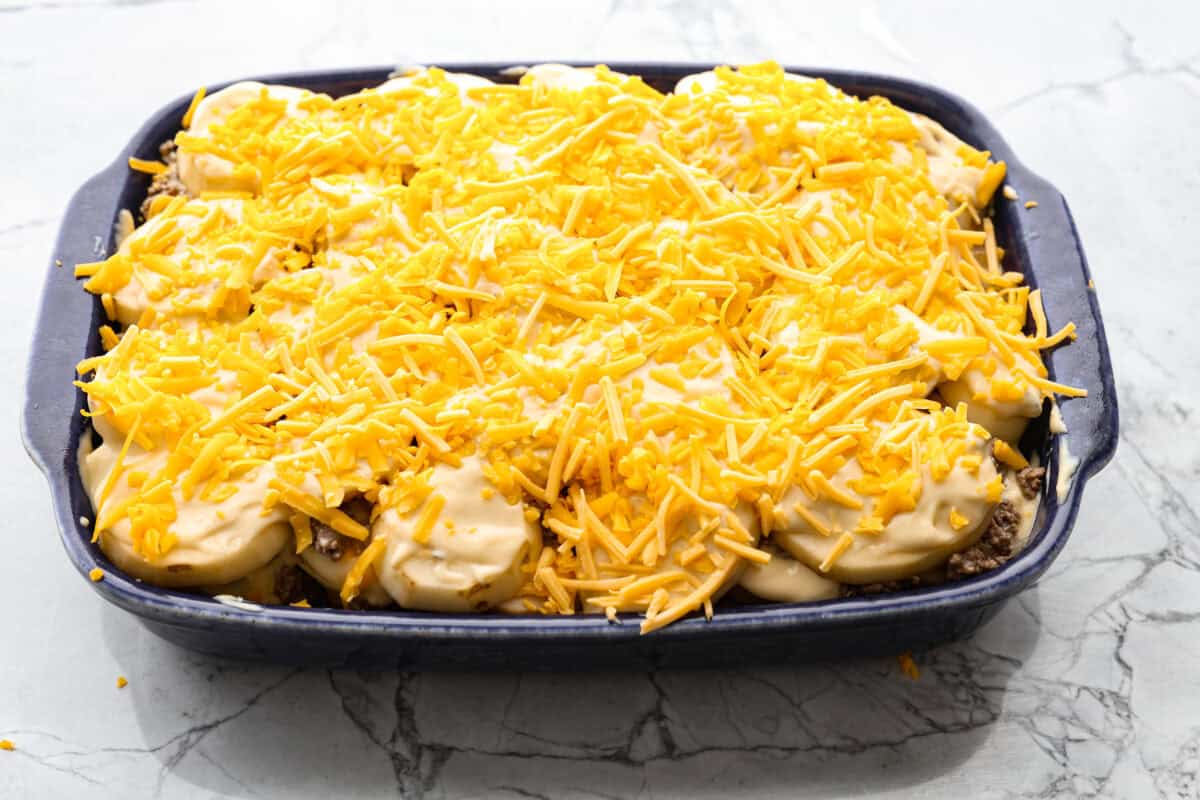 Overhead shot of hamburger potato casserole ready to go in the oven. 