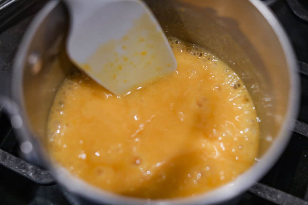 Tenth photo of the German topping butter and milk mixture boiling.