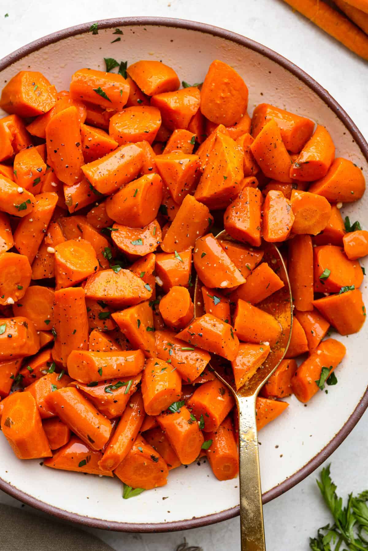 Overhead shot of crockpot carrots on a serving platter. 