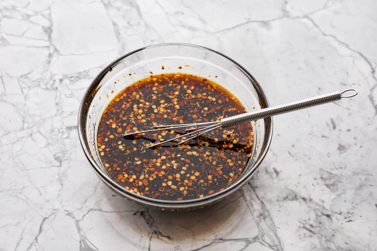 Overhead shot of sauce ingredients mixed together in a bowl. 