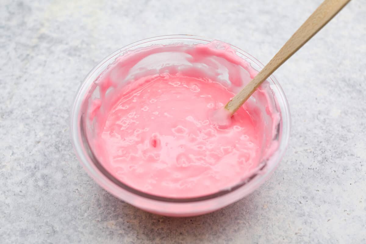 Overhead shot of fondant with invertase and extract mixed in. 