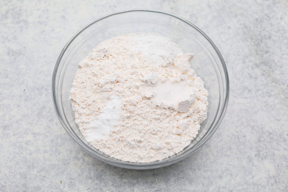 Overhead shot of dry ingredients in a mixing bowl. 