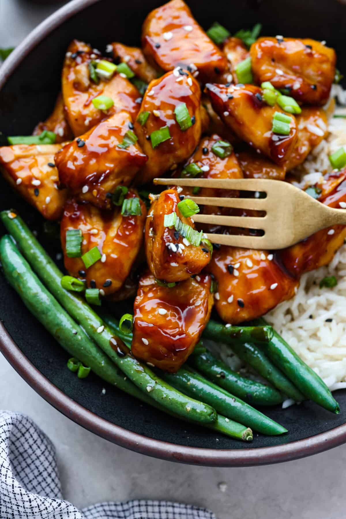 Close up shot of plated air fryer teriyaki chicken. 